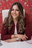 Dra. Jenny Licelotte Then Nuñez, Neumóloga en Hospital Metropolitano de Santiago, especializada en enfermedades pulmonares crónicas y tratamiento de trastornos del sueño.